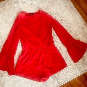 Red trumpet sleeve romper